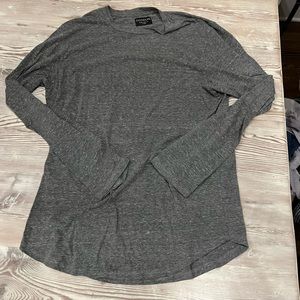Grey long sleeve tee.